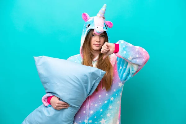 Young Caucasian Girl Unicorn Pajamas Holding Pillow Isolated Blue Background — Stock Photo, Image