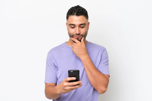 Young Arab Handsome Man Isolated White Background Thinking Sending Message — стоковое фото