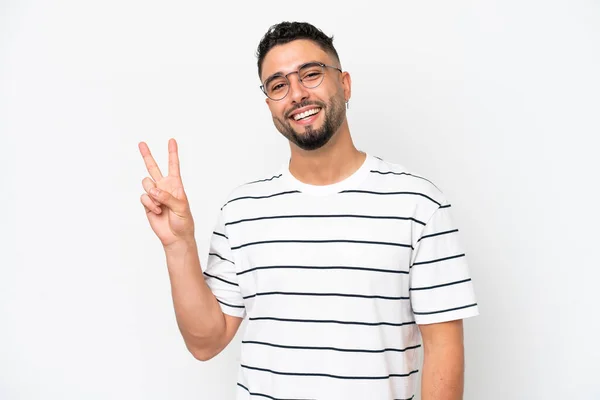 Młody Arab Przystojny Mężczyzna Odizolowany Białym Tle Uśmiechając Się Pokazując — Zdjęcie stockowe