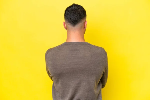 Young Arab Handsome Man Isolated Yellow Background Back Position — 스톡 사진