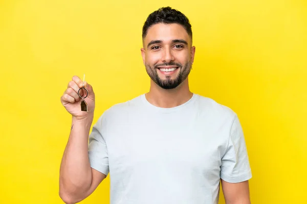 Young Arab Man Holding Home Keys Isolated Yellow Background Smiling — Foto de Stock