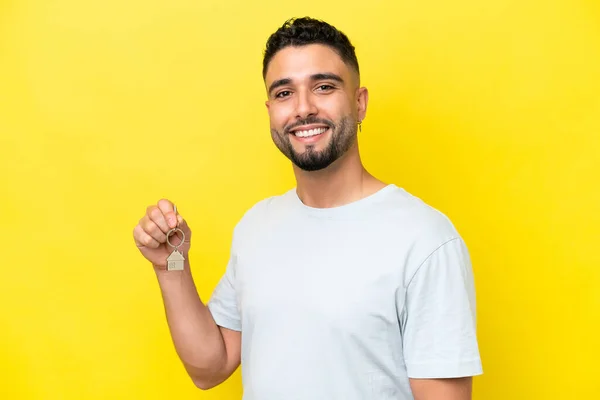 Young Arab Man Holding Home Keys Isolated Yellow Background Smiling — 스톡 사진