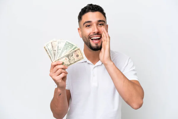 Young Arab Man Taking Lot Money Isolated White Background Shouting — Φωτογραφία Αρχείου