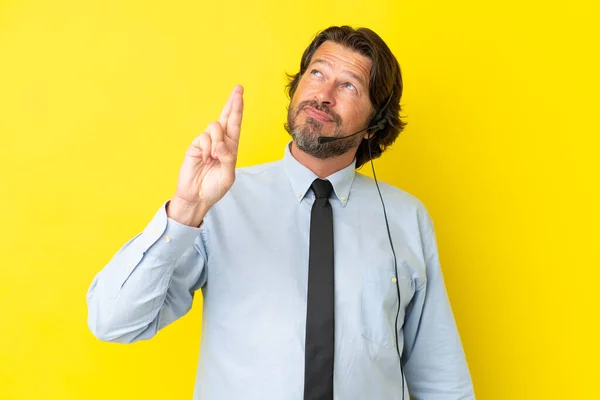 Telemarketer Dutch Man Working Headset Isolated Yellow Background Fingers Crossing — Stock Photo, Image