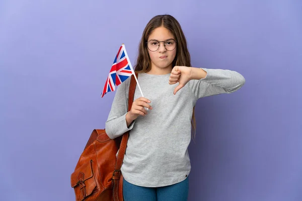 Child Holding United Kingdom Flag Isolated Background Showing Thumb Negative — 스톡 사진