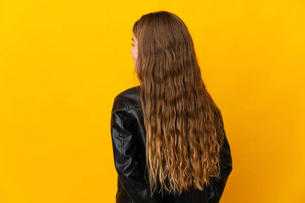 Child Isolated Yellow Background Back Position Looking Back — Fotografia de Stock