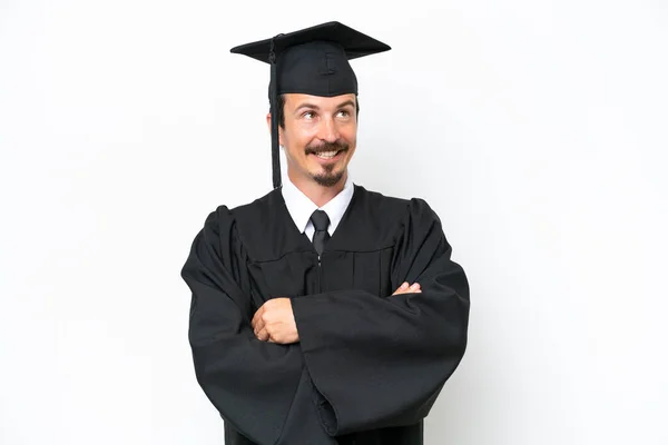 Jovem Universitário Graduado Homem Isolado Fundo Branco Olhando Para Cima — Fotografia de Stock