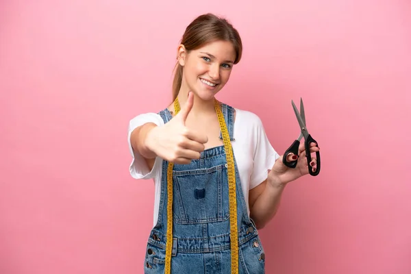 Young Caucasian Seamstress Woman Isolated Pink Background Thumbs Because Something — Stock Photo, Image