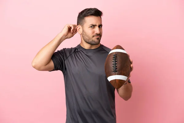 Young Caucasian Man Playing Rugby Isolated Pink Background Having Doubts — Stock Photo, Image