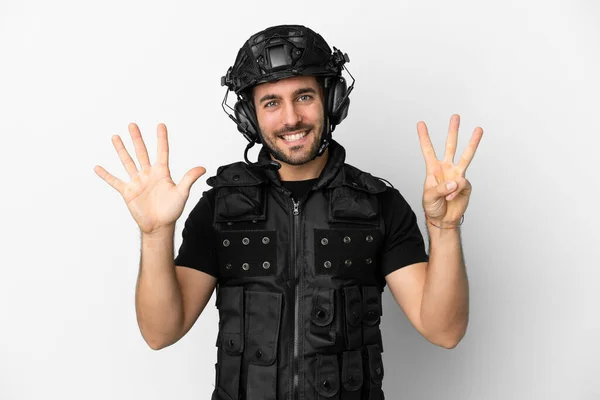 Young Caucasian Swat Isolated White Background Counting Eight Fingers — Foto de Stock