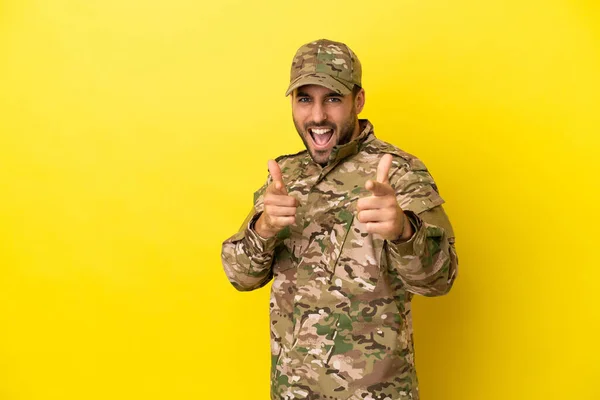Military Man Isolated Yellow Background Pointing Front Smiling — Foto de Stock