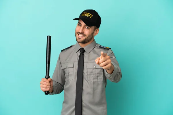 Young Security Man Isolated Blue Background Pointing Front Happy Expression — Foto Stock