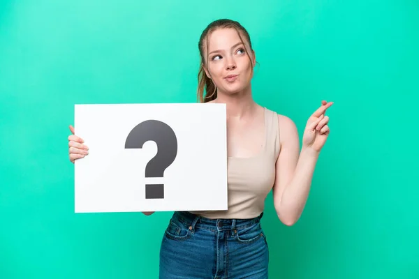 Young Caucasian Woman Isolated Green Background Holding Placard Question Mark — Stock Photo, Image