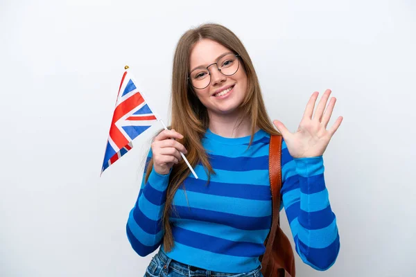 Mulher Branca Jovem Segurando Uma Bandeira Reino Unido Isolada Fundo — Fotografia de Stock