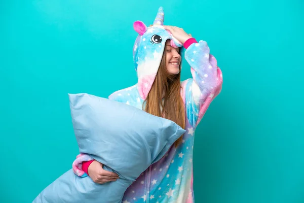 Young Caucasian Girl Unicorn Pajamas Holding Pillow Isolated Blue Background — Stock Photo, Image