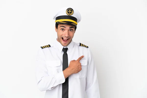 Airplane Pilot Isolated White Background Surprised Pointing Side — Φωτογραφία Αρχείου