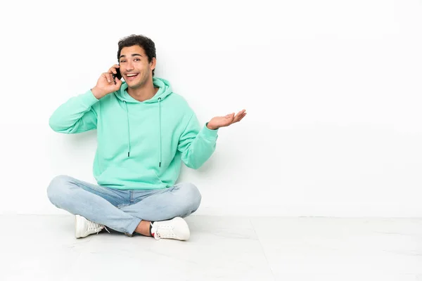 Caucasian Handsome Man Sitting Floor Keeping Conversation Mobile Phone Someone — Zdjęcie stockowe