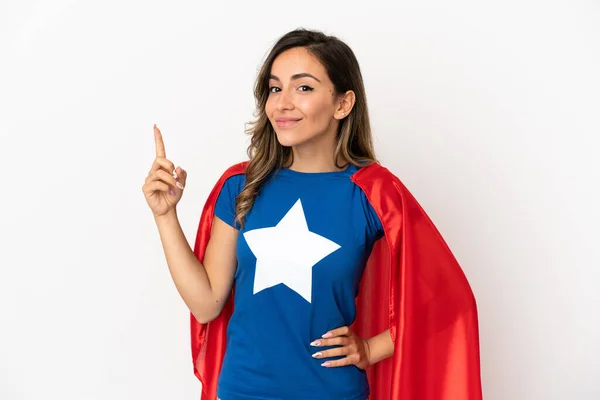 Super Hero woman over isolated white background pointing with the index finger a great idea
