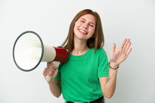 Young English Woman Isolated White Background Holding Megaphone Saluting Hand — ストック写真