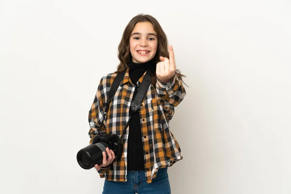 Little photographer girl isolated on background doing coming gesture