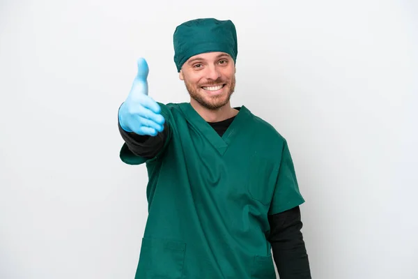 Surgeon Brazilian Man Green Uniform Isolated White Background Shaking Hands — Foto de Stock