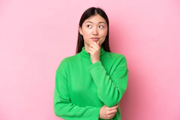Young Chinese Woman Isolated Pink Background Thinking Idea While Looking —  Fotos de Stock