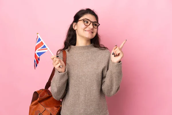 Young Russian Woman Holding United Kingdom Flag Isolated Pink Background — Stock Photo, Image