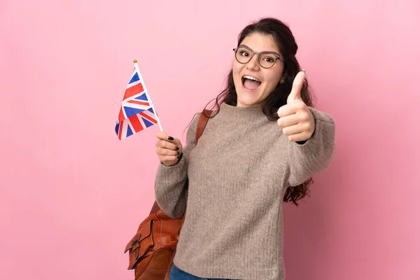 Young Russian Woman Holding United Kingdom Flag Isolated Pink Background — ストック写真