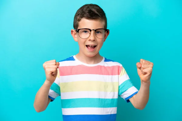 Little Boy Isolated Blue Background Glasses Celebrating Victory — 图库照片