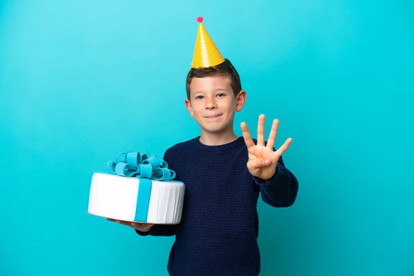 Ragazzino Tenendo Torta Compleanno Isolato Sfondo Blu Felice Contando Quattro — Foto Stock