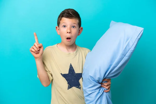Little Boy Pajamas Isolated Blue Background Intending Realizes Solution While — стоковое фото