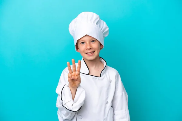 Piccolo Chef Ragazzo Isolato Sfondo Blu Felice Contando Tre Con — Foto Stock