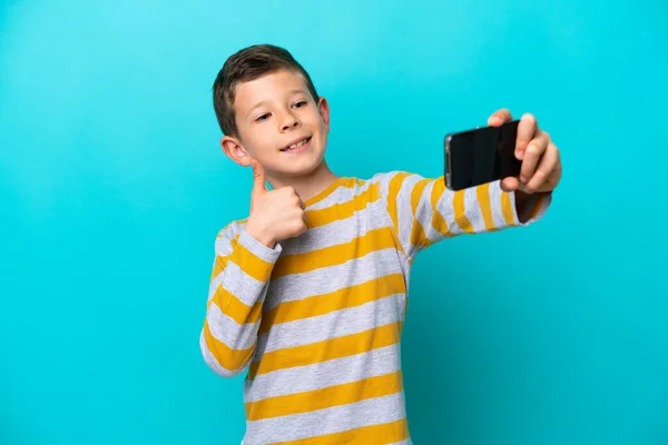 Little Boy Isolated Blue Background Making Selfie Mobile Phone — Stock Photo, Image