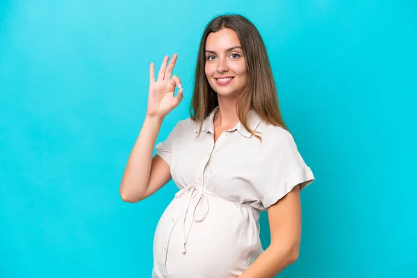 Young Caucasian Woman Isolated Blue Background Pregnant Doing Sign — ストック写真