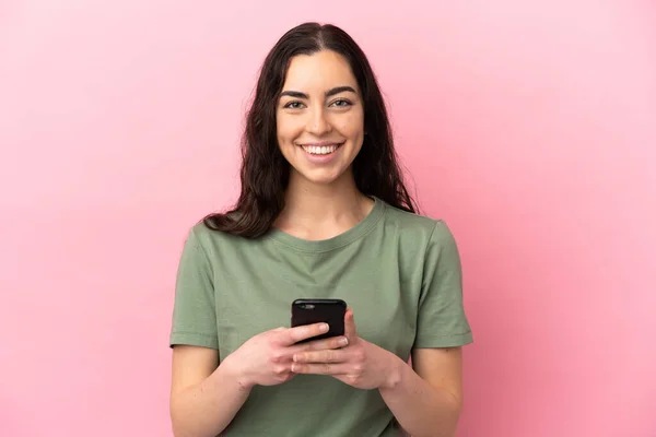 Young Caucasian Woman Isolated Pink Background Looking Camera Smiling While — Fotografia de Stock