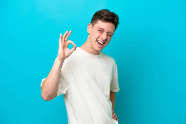 Young Handsome Brazilian Man Isolated Blue Background Showing Sign Fingers — 图库照片