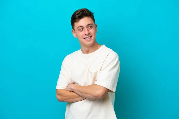 Young Handsome Brazilian Man Isolated Blue Background Arms Crossed Happy — Stock Photo, Image