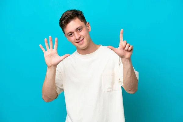 Young Handsome Brazilian Man Isolated Blue Background Counting Seven Fingers — Zdjęcie stockowe