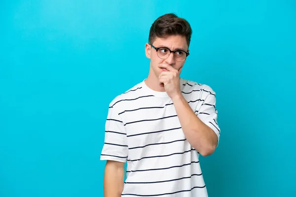 Young Handsome Brazilian Man Isolated Blue Background Having Doubts Confuse — 图库照片