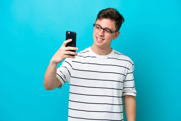 Young Handsome Brazilian Man Isolated Blue Background Making Selfie — Foto de Stock