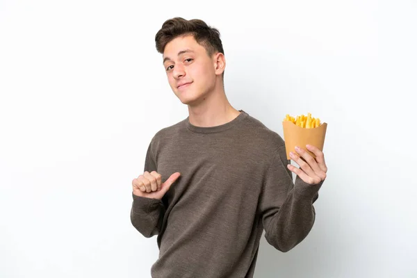 Young Brazilian Man Holding Fried Chips Isolated White Background Proud — 图库照片
