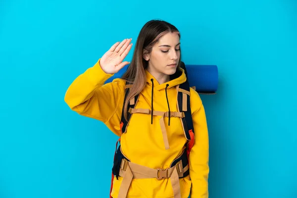 Young Mountaineer Woman Big Backpack Isolated Blue Background Making Stop — Stok fotoğraf
