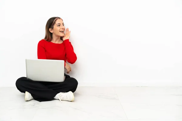 Young Caucasian Woman Laptop Sitting Floor Shouting Mouth Wide Open — Foto Stock