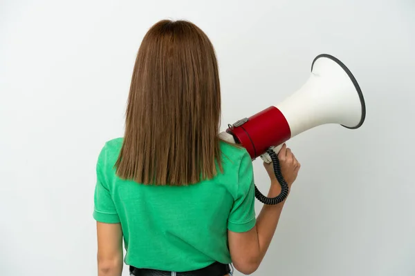 Young English Woman Isolated White Background Holding Megaphone Back Position — ストック写真