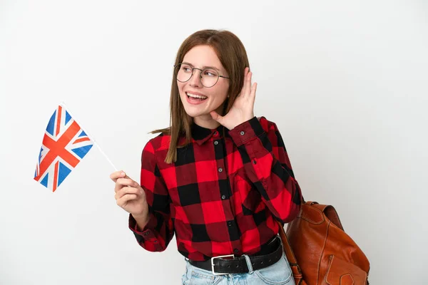 Mladá Žena Drží Vlajku Spojeného Království Izolované Modrém Pozadí Něco — Stock fotografie