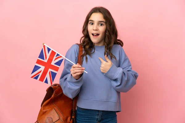 Little Girl Holding United Kingdom Flag Isolated Pink Background Surprise — Stock Fotó
