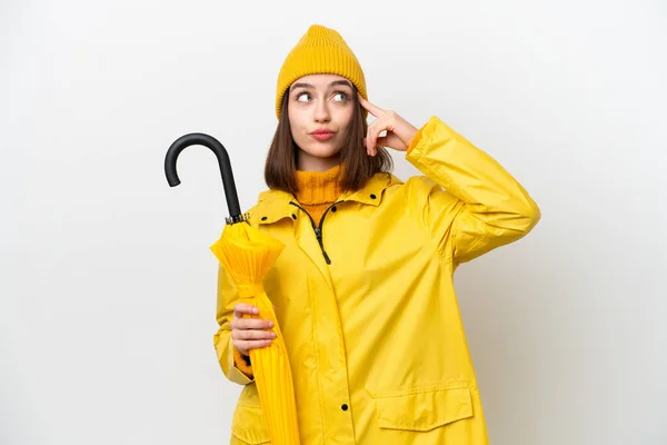 Yağmura Dayanıklı Ceketi Şemsiyesi Olan Genç Ukraynalı Kadının Beyaz Arka — Stok fotoğraf