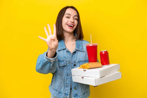 Young Ukrainian Woman Holding Fast Food Isolated Yellow Background Happy — Stock Photo, Image