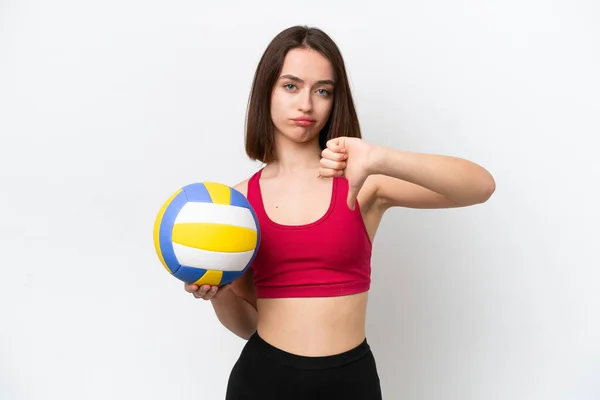 Молодая Украинка Играет Волейбол Белом Фоне Показывая Большой Палец Вниз — стоковое фото