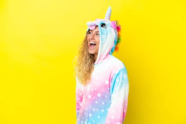 Girl Curly Hair Wearing Unicorn Pajama Isolated Yellow Background Laughing — Stock Photo, Image
